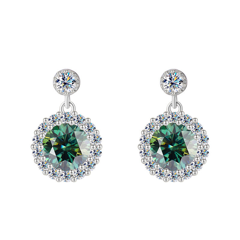 Entdecken Sie unsere eleganten Lustre Halo Ohrringe mit rundem Moissanit und zartem Halo. Mit Zertifikat & gefertigt aus 925er Silber. Blau
